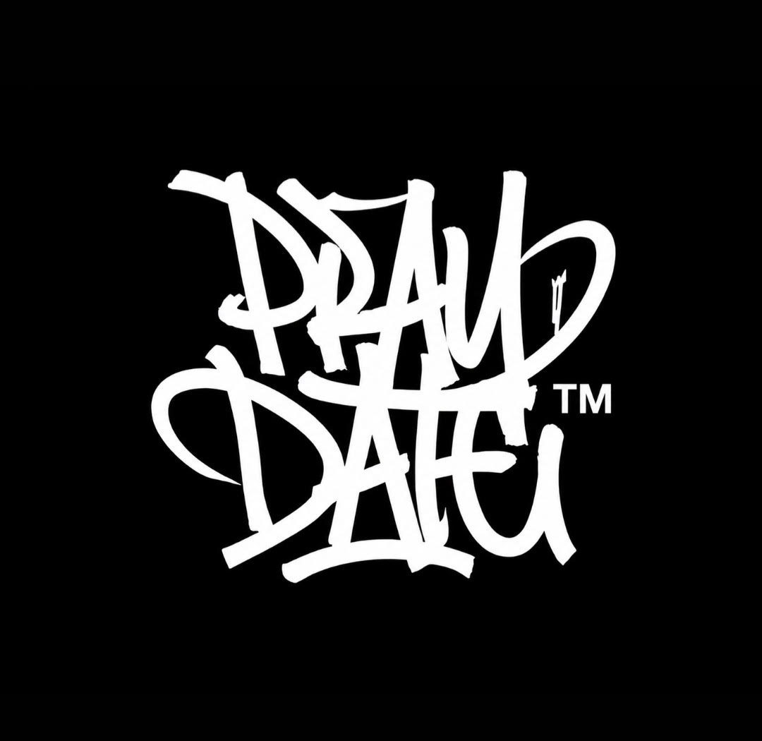 Graffiti-style text reading 'DREAM DARE' in white on a black background.