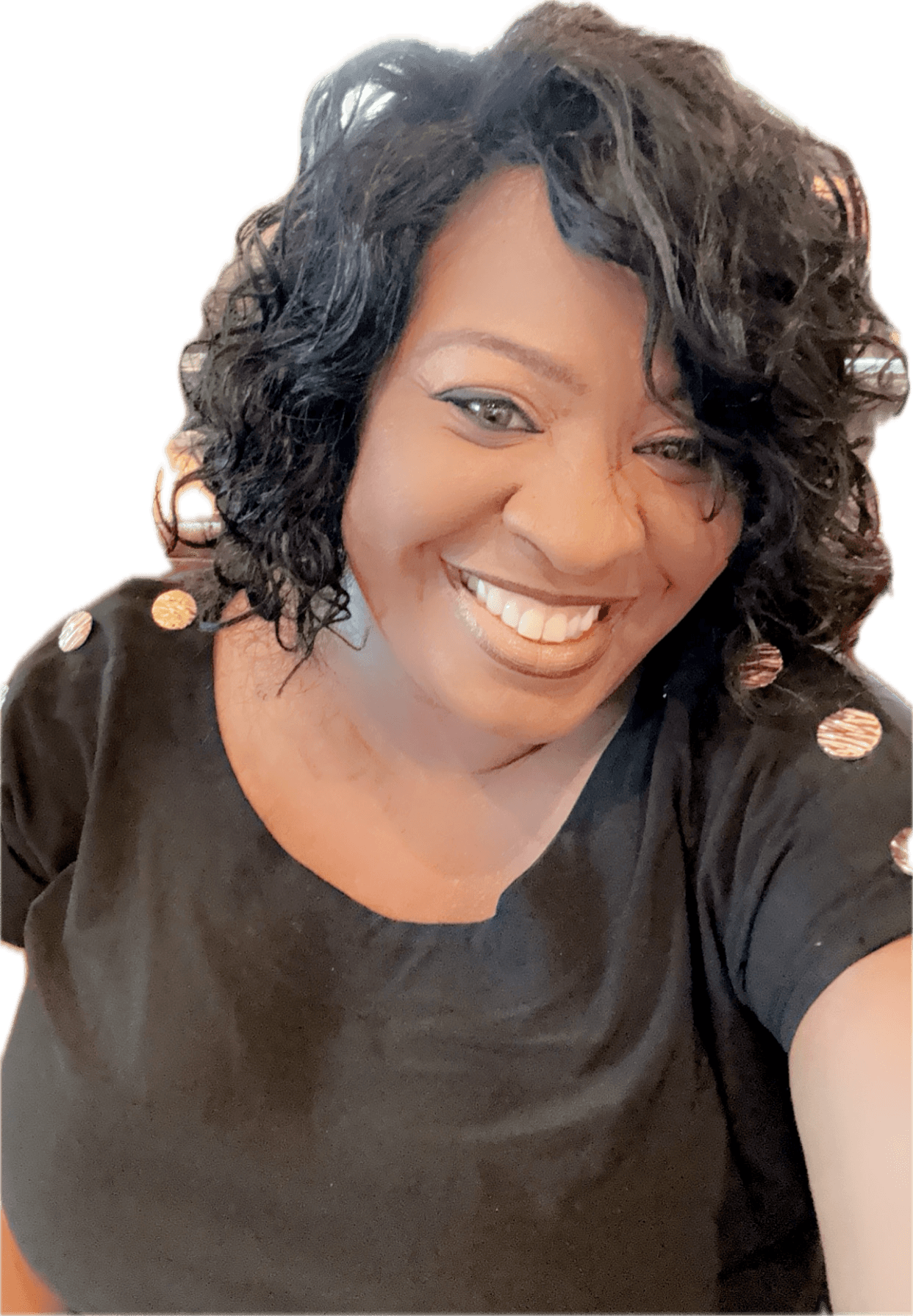 Smiling woman with curly hair wearing a black top with gold accents, against a black background.