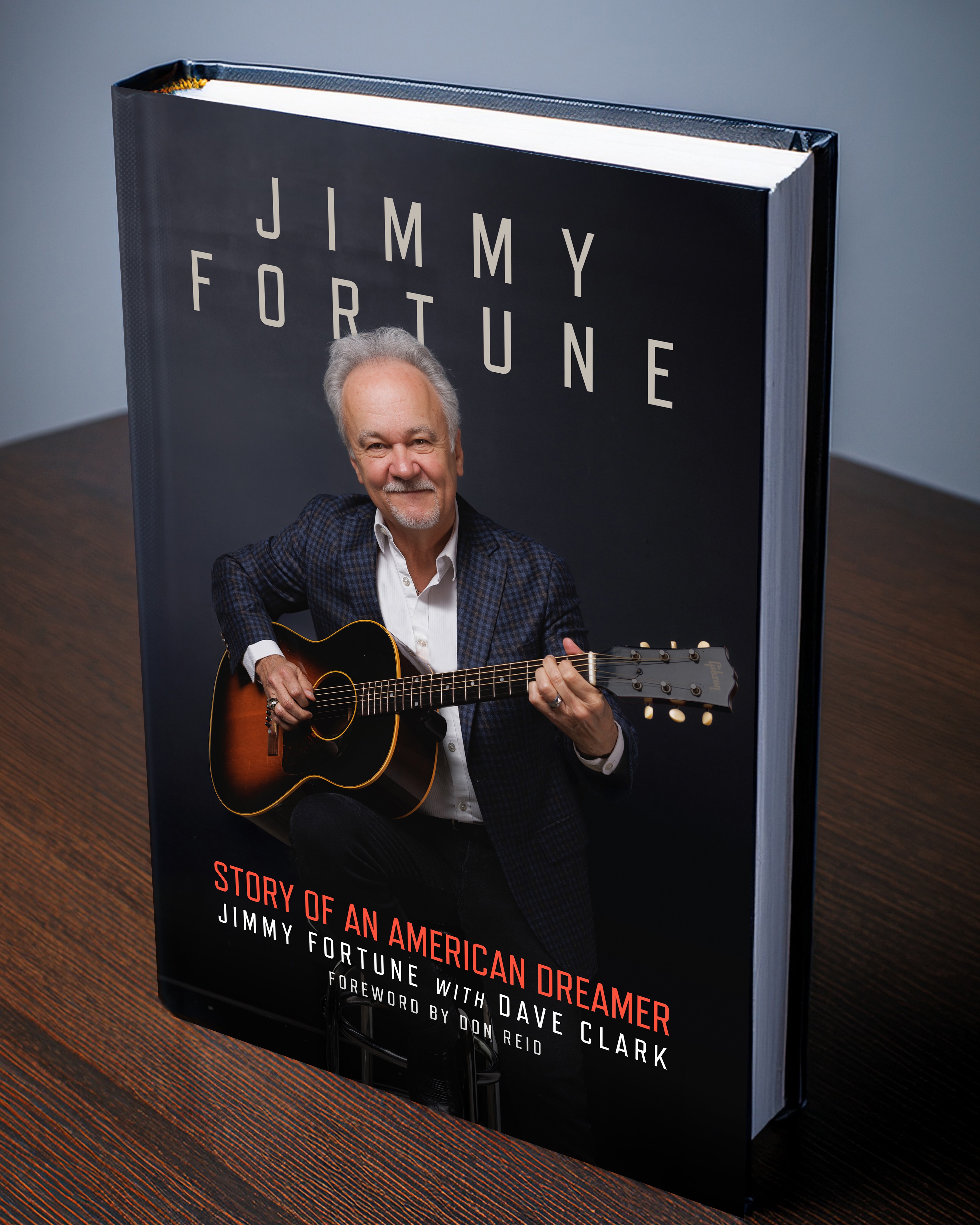 Book cover featuring Jimmy Fortune holding a guitar, with his name and book title in white and red text.