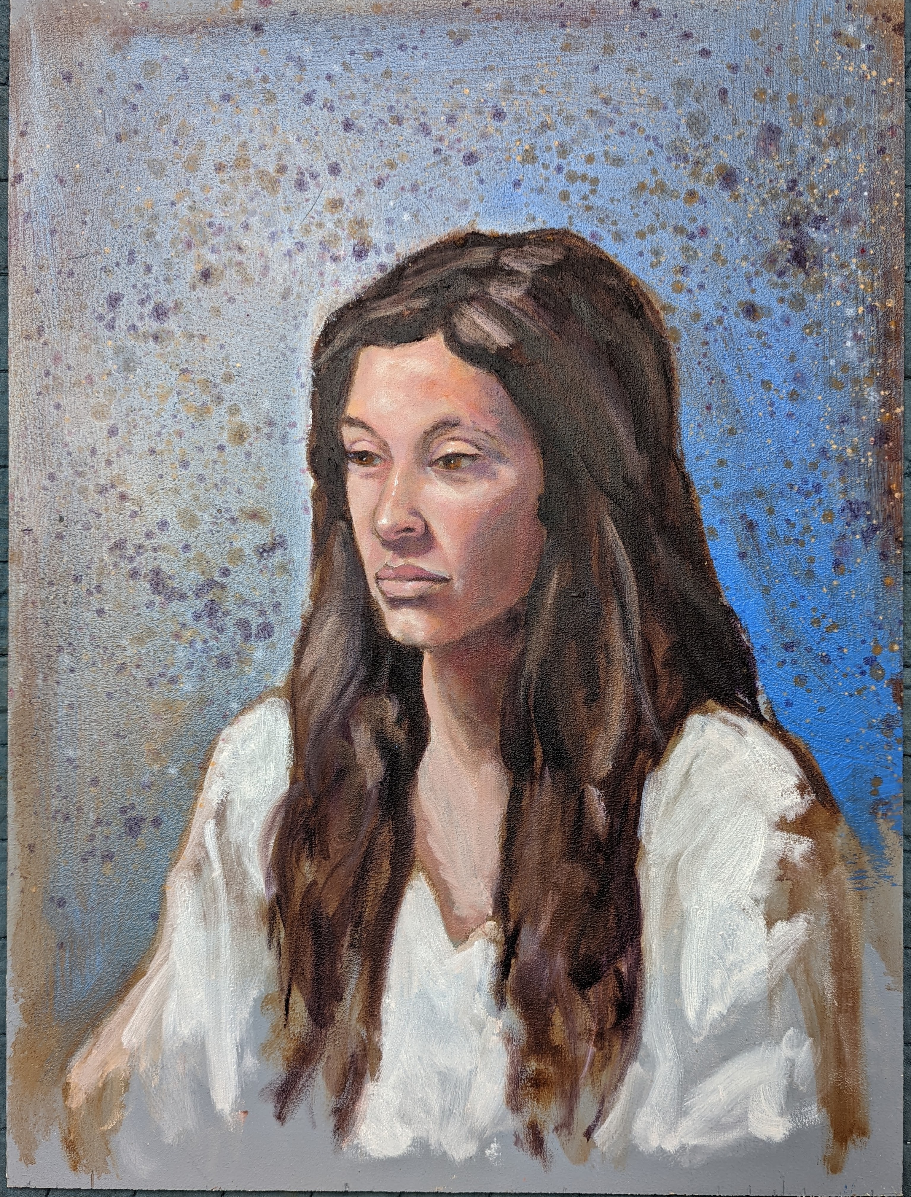 Portrait of a woman with long brown hair, wearing a white top, looking to the side against a speckled background.