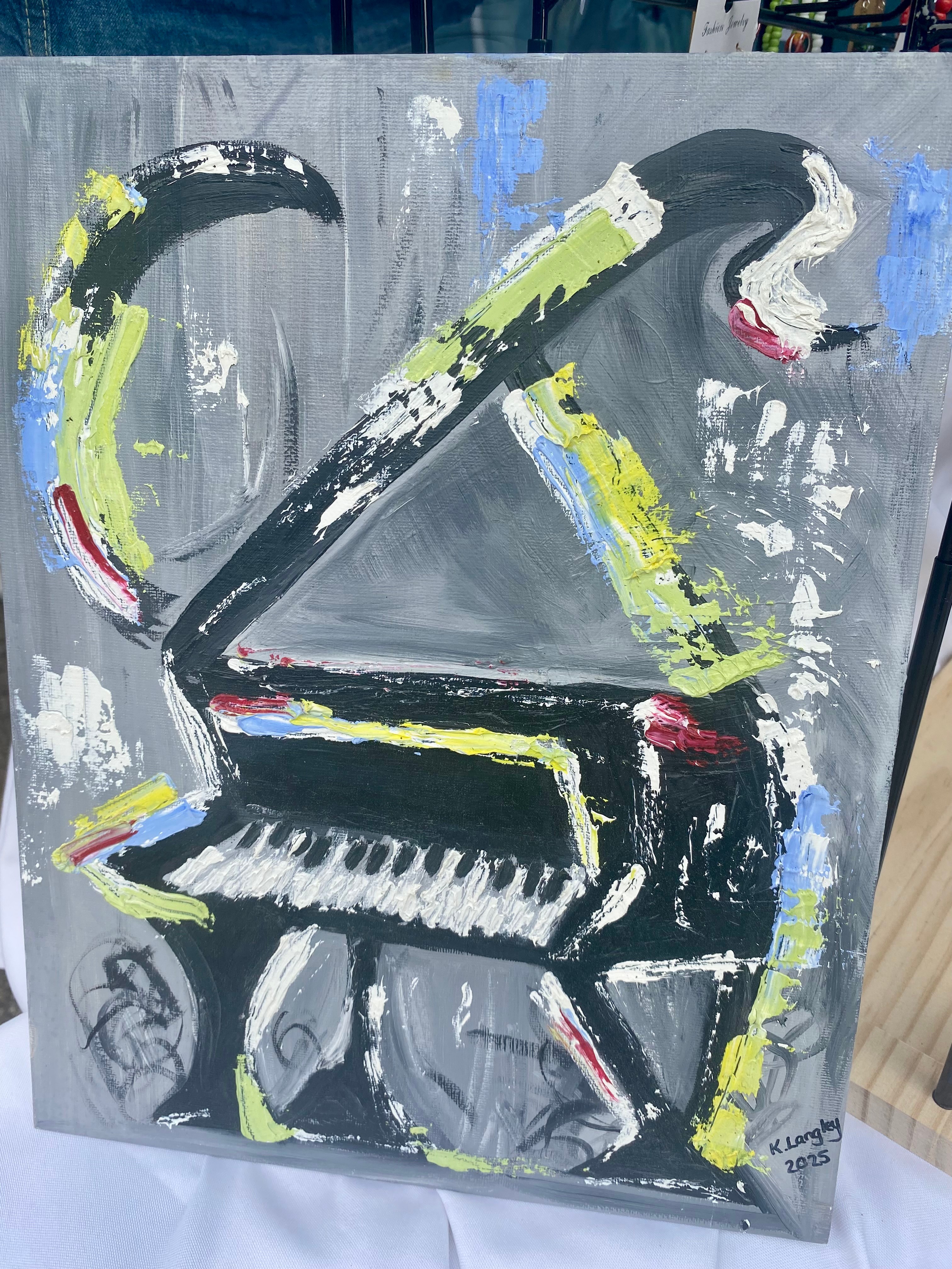 Abstract painting of a swan with a piano body, using bold brushstrokes in black, yellow, white, and red on a gray background.