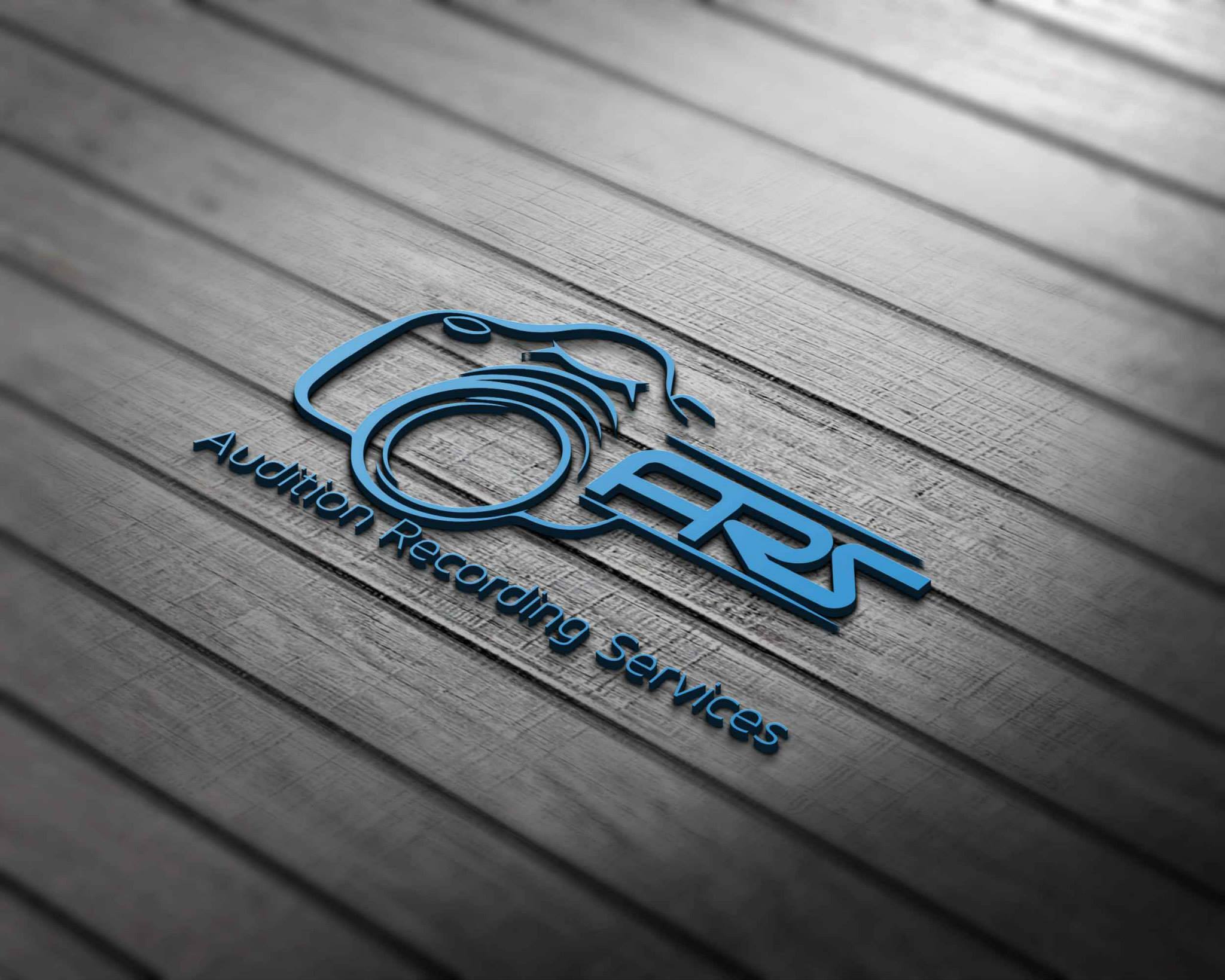 Logo with a stylized microphone and the text 'Auburn Recording Services' on a wooden surface.