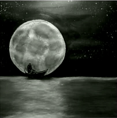A person sitting on a boat in water with a large, bright full moon in the night sky, stars visible around.