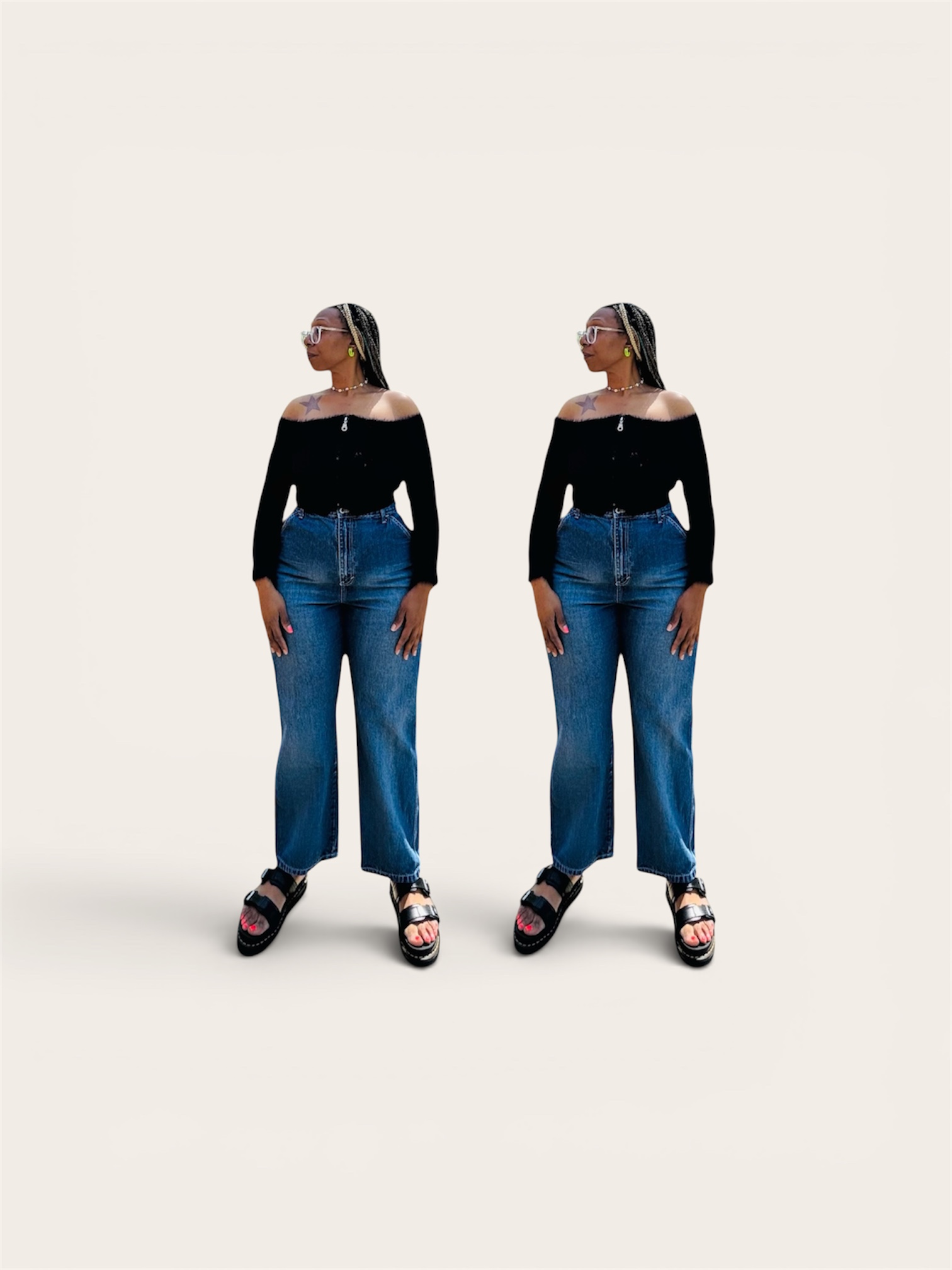Two women stand side by side wearing black off-shoulder tops, blue jeans, and sandals, against a plain background.