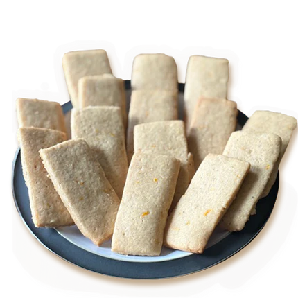 Plate with rectangular white bread slices arranged in a circle against a black background.