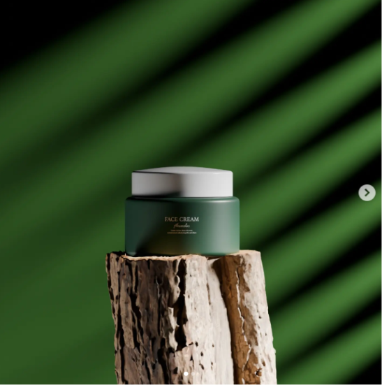A green jar of face cream on a textured wooden stump with green shadows in the background.